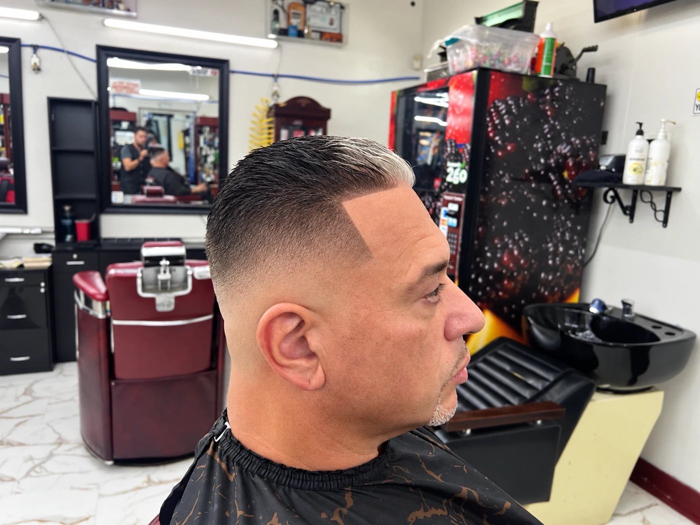 Skin fade with slicked-back top